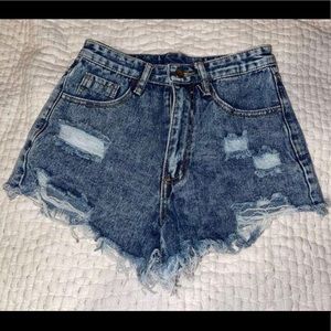 Ripped blue jean shorts
